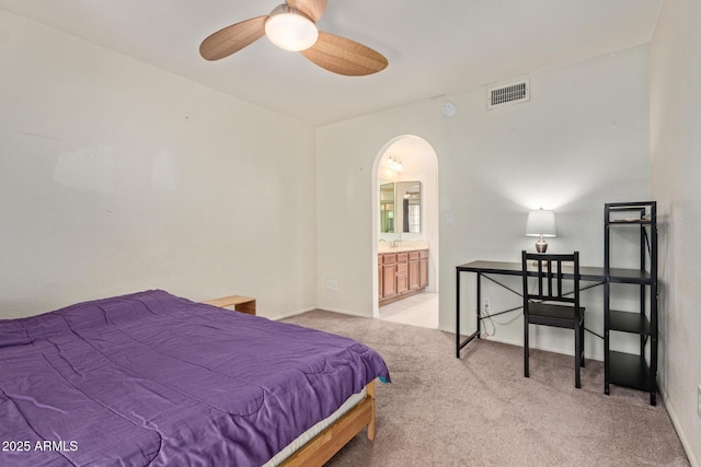 609 E Mesquite Cir Unit D133, Tempe, AZ 85288 - carpeted bedroom featuring arched walkways and ensuite bath