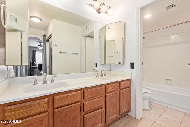 609 E Mesquite Cir Unit D133, Tempe, AZ 85288 - full bath featuring tile patterned floors, double vanity, and tub / shower combination