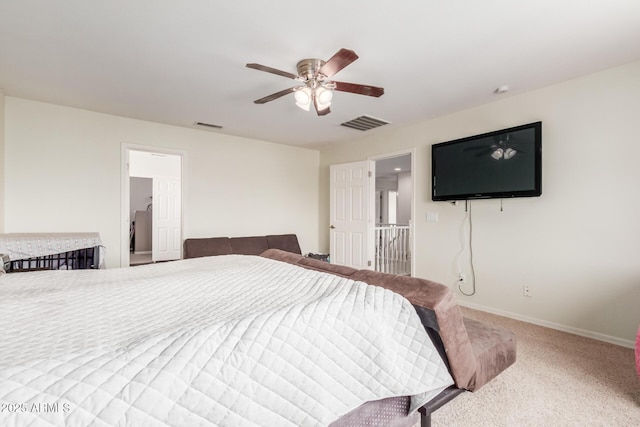 carpeted bedroom featuring visible vents, a ceiling fan, and baseboards