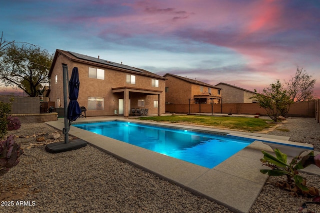 view of swimming pool with a gazebo, a patio area, a fenced backyard, and a fenced in pool