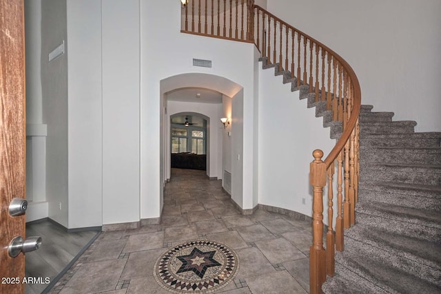 foyer featuring a high ceiling