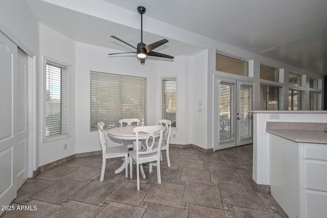 dining area featuring french doors and ceiling fan