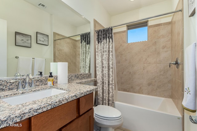 full bathroom with vanity, toilet, and shower / bath combo