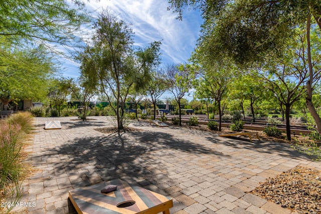 surrounding community featuring a patio