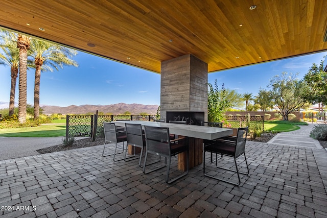 view of patio / terrace with a mountain view