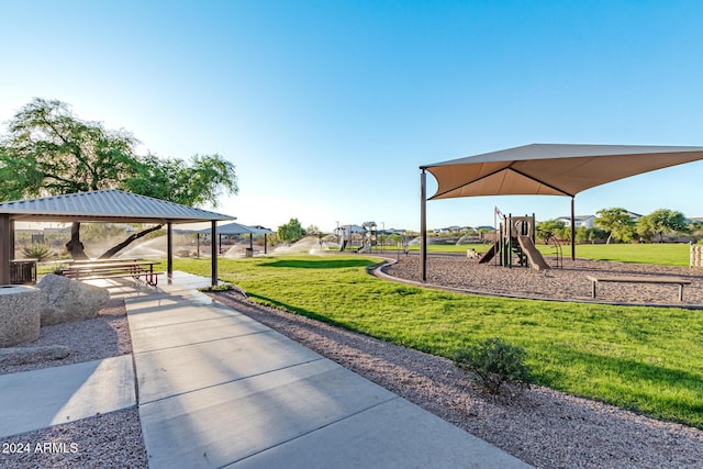 communal playground with a gazebo and a yard