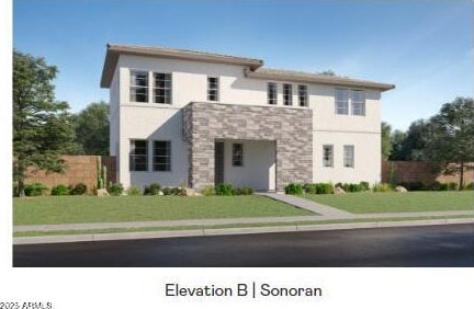 view of front of home featuring a front yard