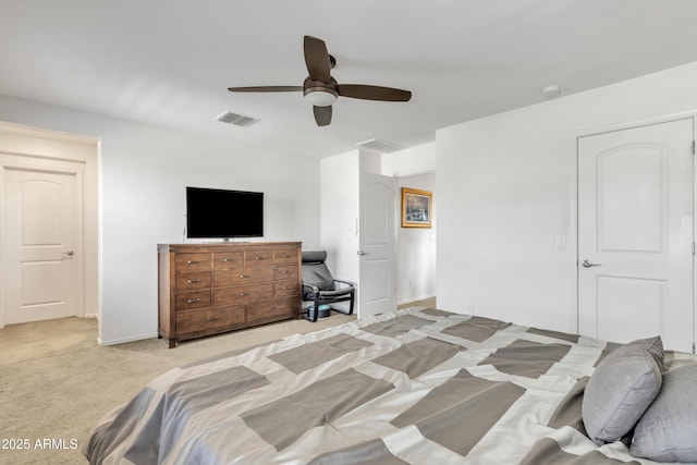 bedroom with a ceiling fan, visible vents, and light colored carpet