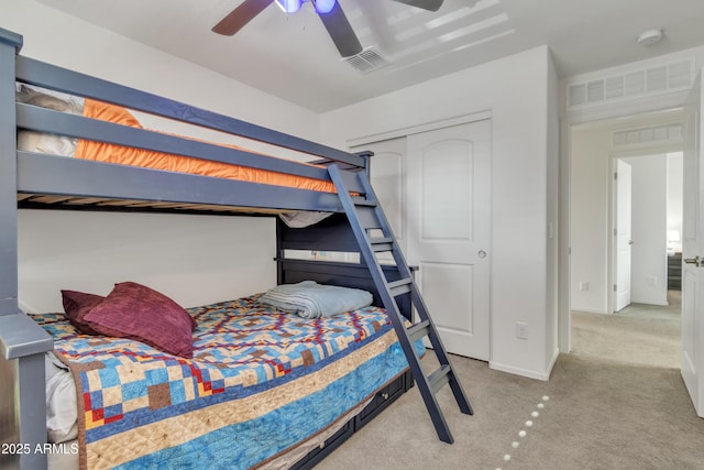 bedroom featuring baseboards, ceiling fan, visible vents, and carpet flooring