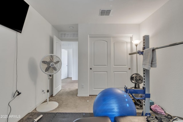 workout area featuring carpet and visible vents