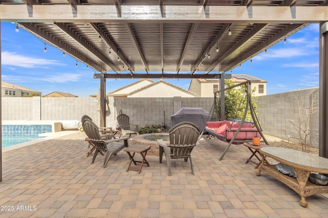 view of patio / terrace featuring a fenced backyard, a fenced in pool, and a pergola