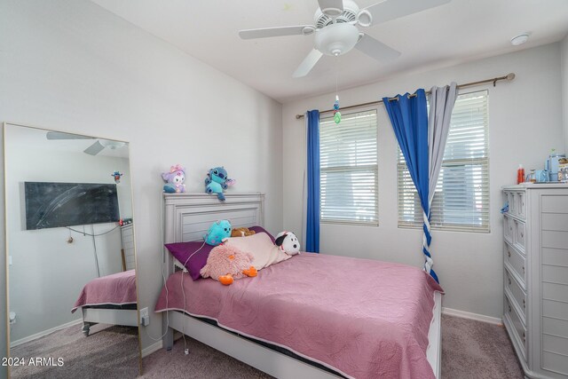 carpeted bedroom featuring ceiling fan