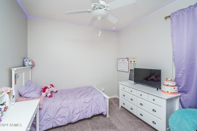 bedroom with light carpet and ceiling fan