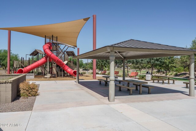 view of home's community with a playground