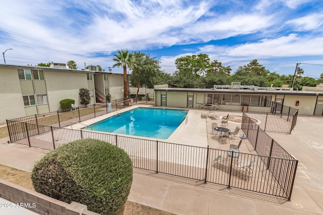 6767 N 7th St Unit 230, Phoenix, AZ 85014 - community pool featuring a patio area and stairway