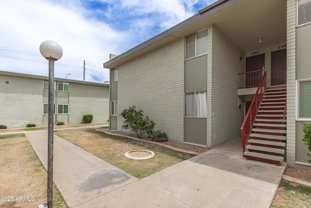 6767 N 7th St Unit 230, Phoenix, AZ 85014 - view of side of property featuring stairway