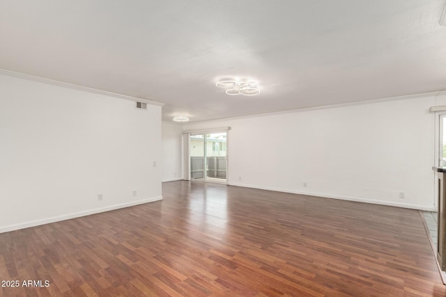 6767 N 7th St Unit 230, Phoenix, AZ 85014 - spare room with dark wood finished floors, baseboards, and crown molding