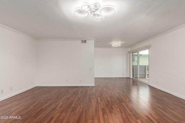 6767 N 7th St Unit 230, Phoenix, AZ 85014 - unfurnished room with wood finished floors, ornamental molding, a chandelier, and baseboards