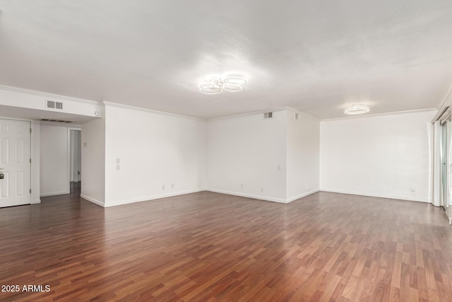 6767 N 7th St Unit 230, Phoenix, AZ 85014 - spare room featuring wood finished floors and baseboards