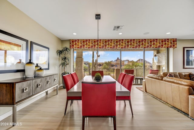 dining room featuring light wood-type flooring