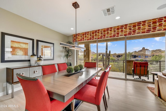 dining area featuring light hardwood / wood-style floors