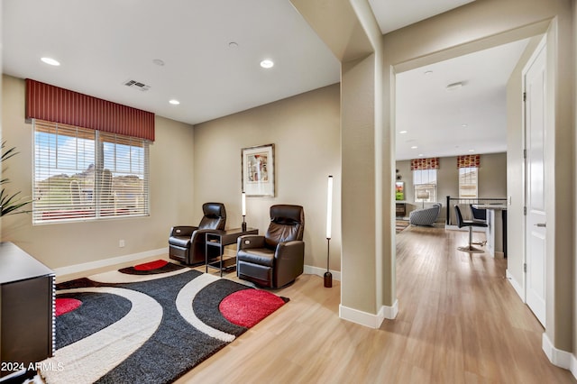 living area featuring light hardwood / wood-style floors