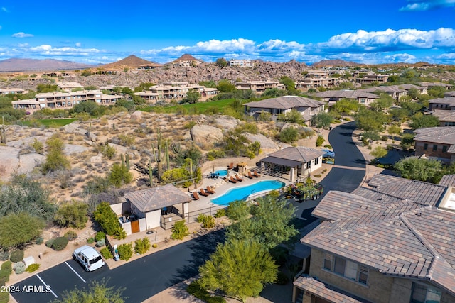 birds eye view of property featuring a mountain view