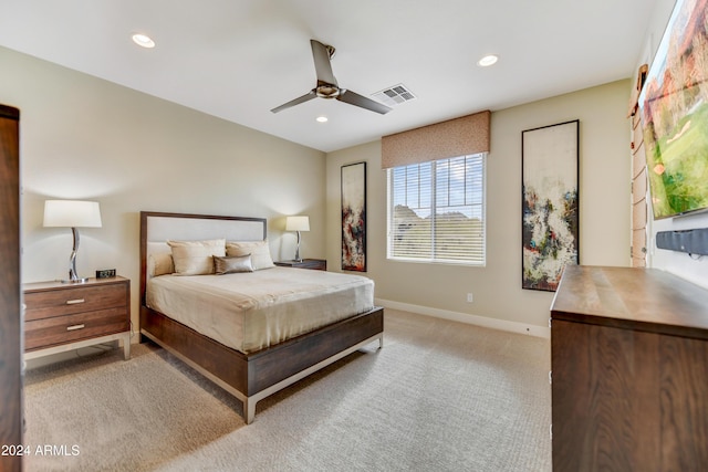 carpeted bedroom with ceiling fan