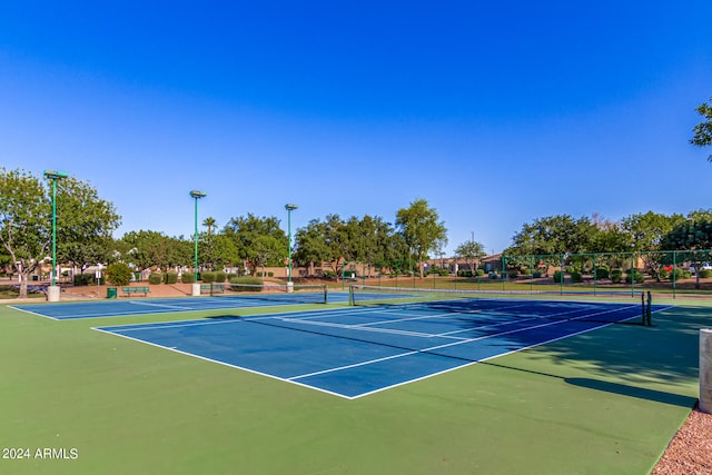 view of sport court featuring basketball hoop