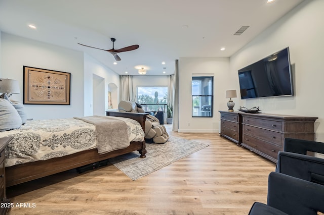 bedroom with ceiling fan, light wood-style flooring, baseboards, visible vents, and recessed lighting