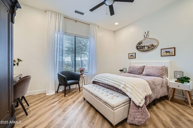 bedroom with light wood-type flooring, baseboards, visible vents, recessed lighting, and a ceiling fan