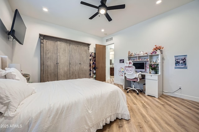 bedroom featuring a ceiling fan, light wood-style floors, baseboards, visible vents, and recessed lighting