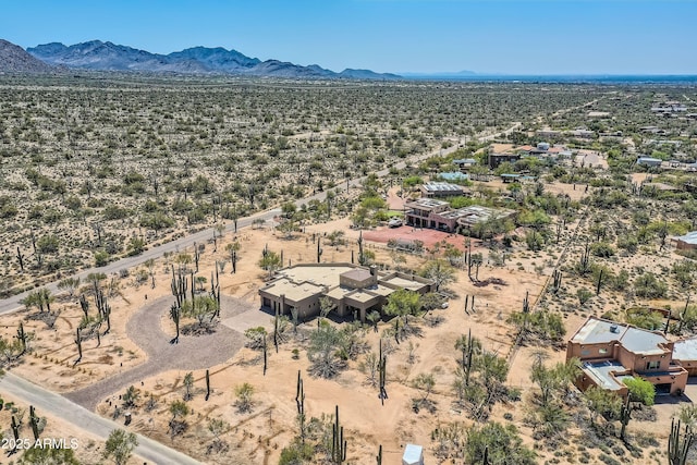 aerial view featuring view of desert, a rural view, and a mountain view