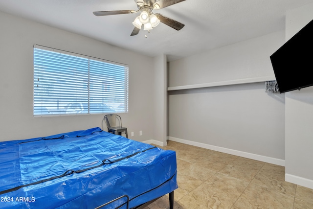 bedroom featuring ceiling fan