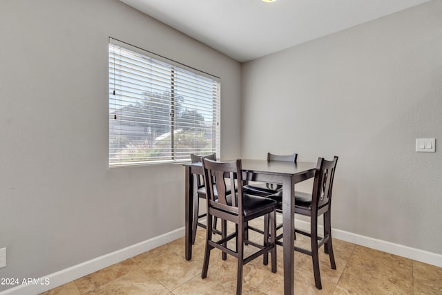 view of tiled dining room