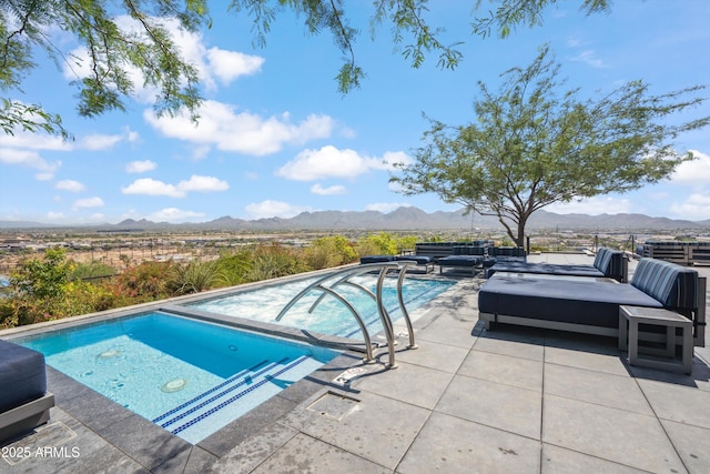 7180 E Kierland Blvd Unit 507, Scottsdale, AZ 85254 - outdoor pool with a mountain view, an outdoor hangout area, and a patio