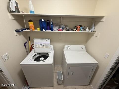 1038 S Palomino Creek Dr, Gilbert, AZ 85296 - washroom featuring separate washer and dryer and tile patterned floors