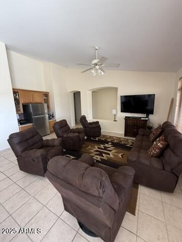 1038 S Palomino Creek Dr, Gilbert, AZ 85296 - living room with light tile patterned flooring and ceiling fan