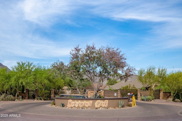 view of front facade with fence and a gate