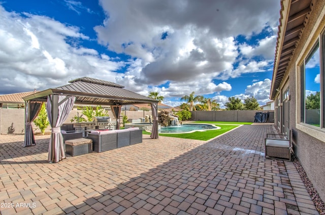 view of patio / terrace featuring a gazebo, a fenced backyard, a fenced in pool, and a grill