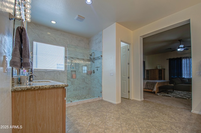 ensuite bathroom featuring a marble finish shower, baseboards, ensuite bath, and ceiling fan