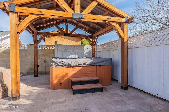 view of patio featuring a hot tub