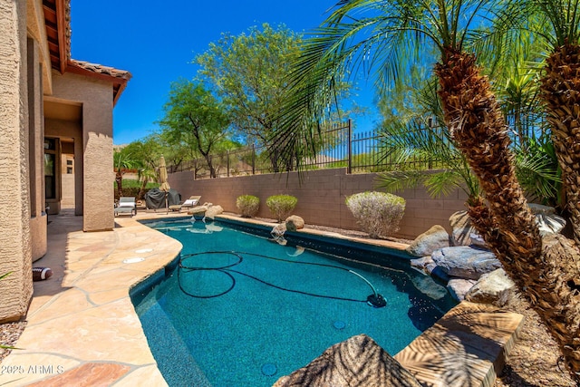 4041 N Silver Ridge Cir, Mesa, AZ 85207 - view of pool with a fenced backyard and a patio area