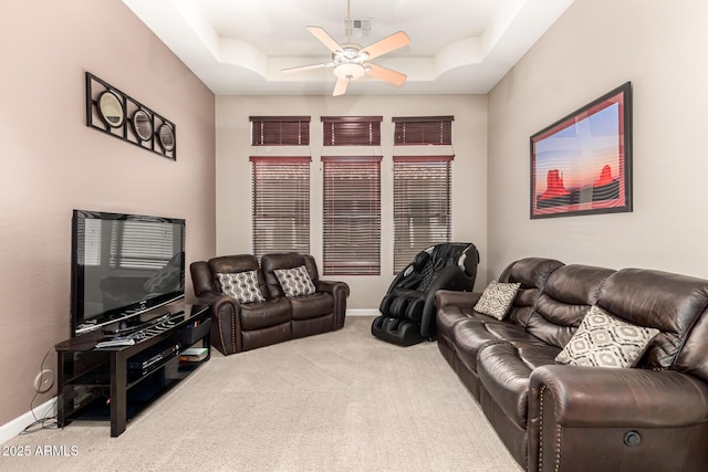 4041 N Silver Ridge Cir, Mesa, AZ 85207 - carpeted living area featuring a ceiling fan and a raised ceiling