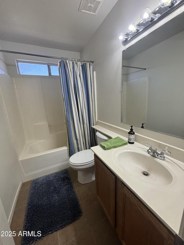 full bath featuring toilet, tile patterned floors, shower / tub combo with curtain, and vanity