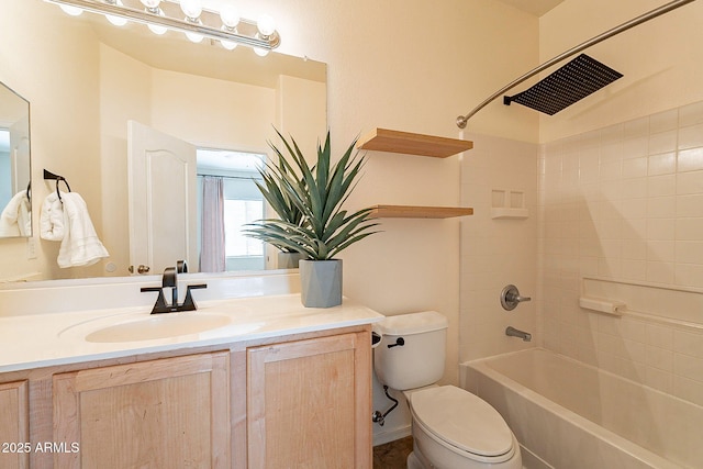 full bathroom featuring toilet, vanity, and shower / bathing tub combination