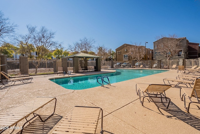 view of swimming pool with a gazebo and a patio