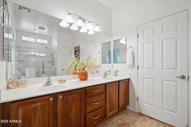 bathroom featuring walk in shower, tile patterned floors, and vanity