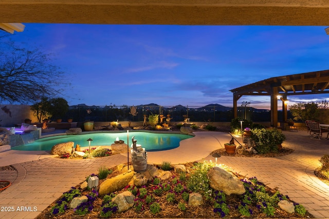 pool at dusk with a patio, a fenced backyard, a pergola, and an outdoor pool