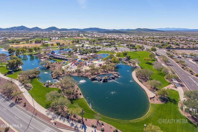 bird's eye view featuring a water and mountain view